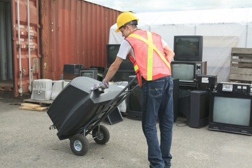 Garage clearance team disposing of items responsibly